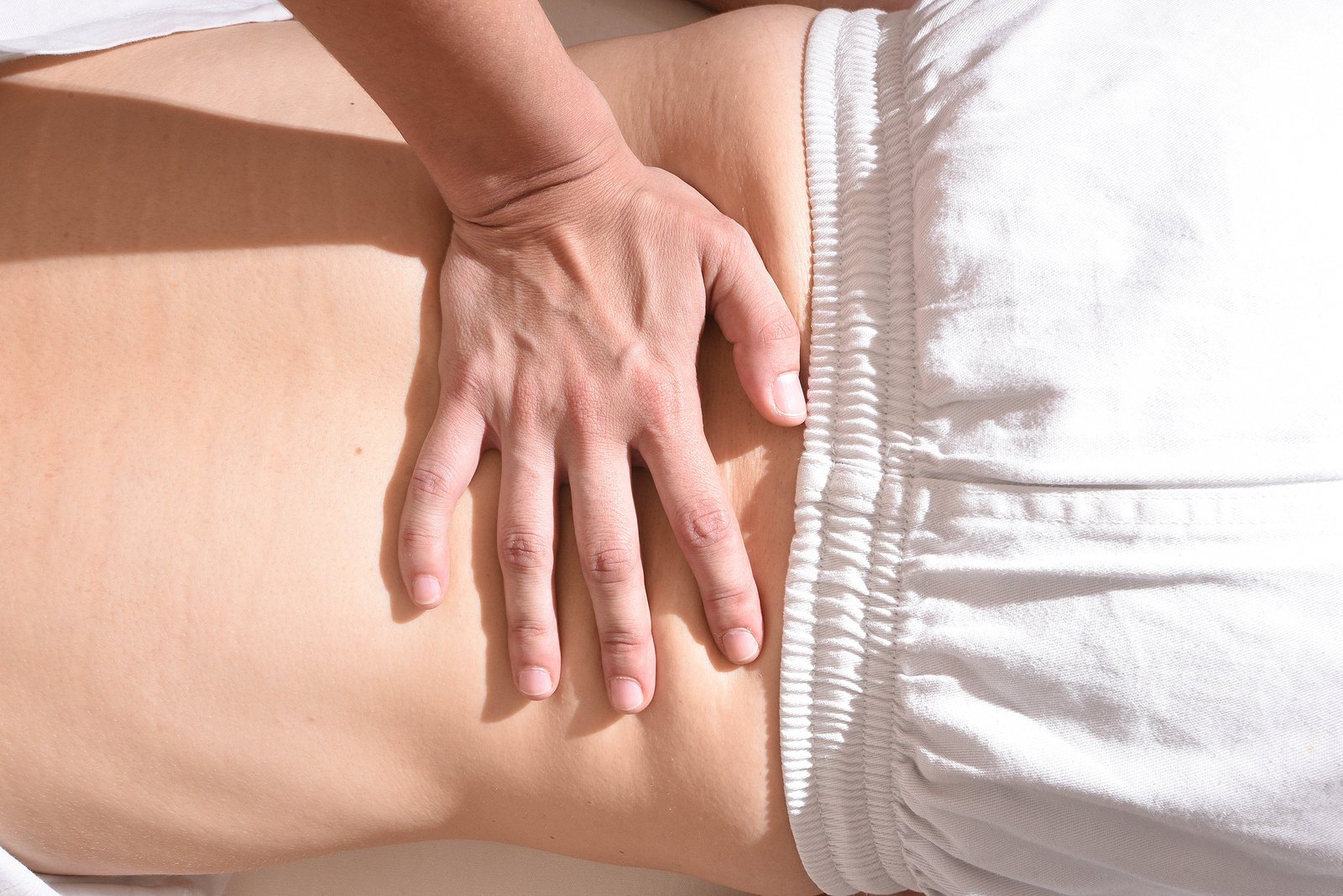 bigstock-Shiatsu-In-The-Back-Massage-405924548