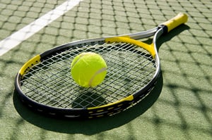 bigstock-Tennis-Racket-And-Ball-On-Cour-4255408