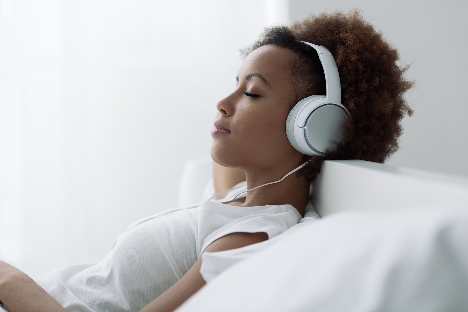 bigstock-Woman-Relaxing-And-Listening-T-169052453